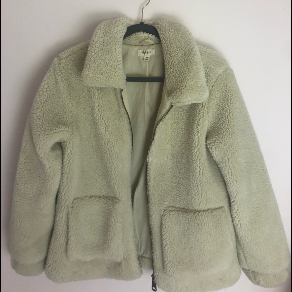 Cream colored fleece jacket